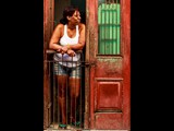 The Lady by the Green Curtained Door  Old Havana