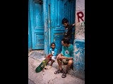 Dad and the Boys with a Lesson on Skateboarding  Old Havana